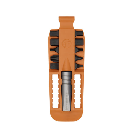 Translation missing: de.Orange Leatherman bit kit holder with multiple interchangeable screwdriver black bits arranged on both sides, and a silver extender, featuring the Leatherman logo embossed in the center