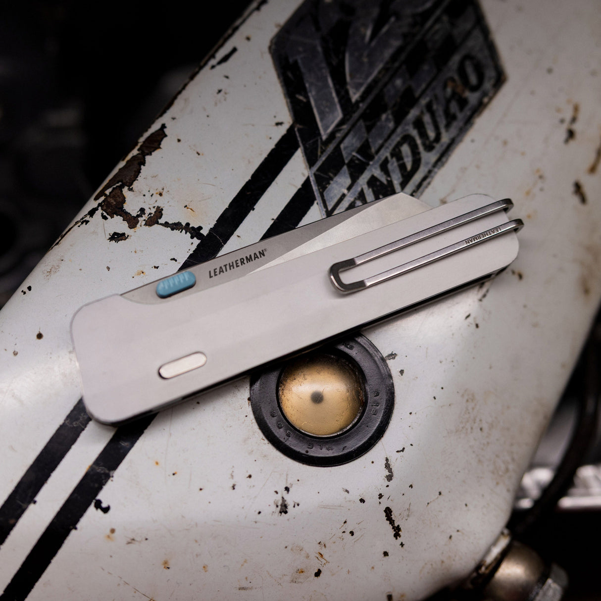 Translation missing: de.Detailed view of Leatherman Glider on a motorcycle, highlighting its sleek finish