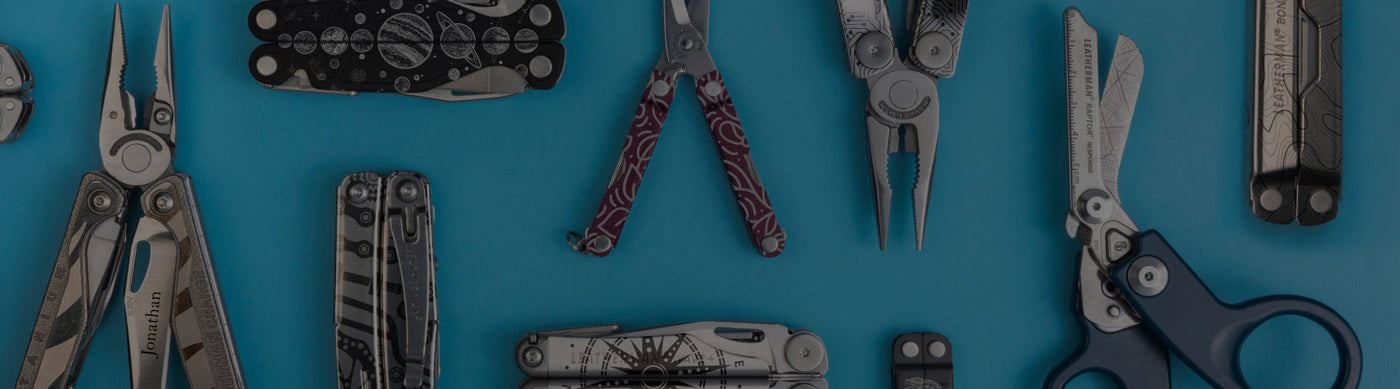 Translation missing: it.An assortment of customized Leatherman tools on a blue background