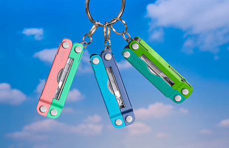 Translation missing: fr.Four Skeletool® CX on a rock surface, varying colors