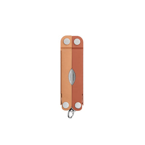 Translation missing: es.Closed view of a Leatherman Micra multi-tool in Pumpkin Spice color, featuring a compact, dual-tone orange aluminum handle and keyring attachment