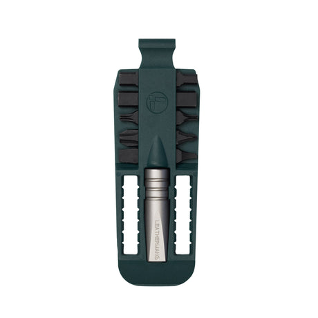 Translation missing: pl.Forest Green Leatherman bit kit holder with multiple interchangeable screwdriver black bits arranged on both sides, and a silver extender, featuring the Leatherman logo embossed in the center