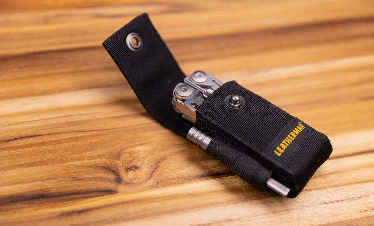 Black nylon Leatherman sheath carrying Leatherman ratchet driver and Leatherman tool