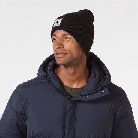 man in black leatherman beanie