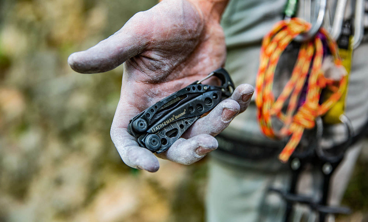 A man holding a skeletool