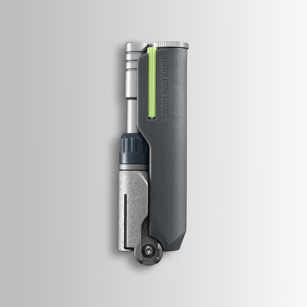 Translation missing: es.Batch #009: Adapter multi-tool in folded form with gray body, metal tip, and neon green accent