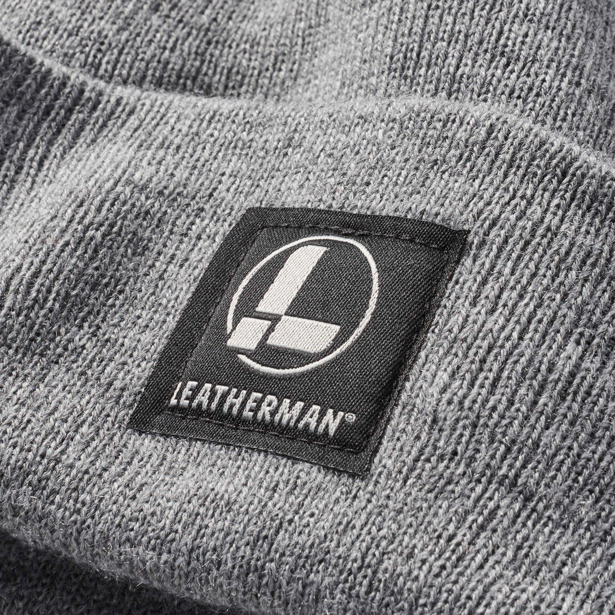 Translation missing: en.Closeup of sewn in leatherman logo on beanie