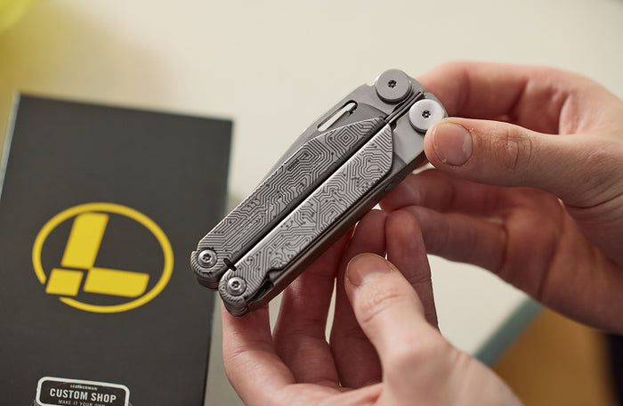 Translation missing: de.An individual holding a Leatherman Wave+ in their hand, indicating showing sleek custom design