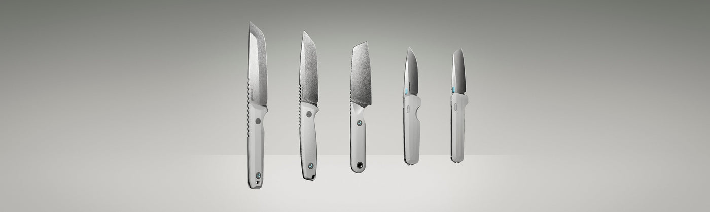 Product display image featuring five Leatherman knives in a clean, gradient-lit studio setting. The lineup includes various blade styles and handle orientations, all in a matching alpine white colorway, showcasing both profile and edge-on views to highlight the craftsmanship and design variations.