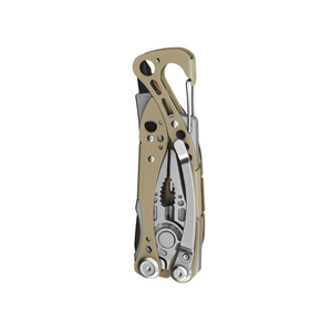 Translation missing: fr.Folded Skeletool Cx multitool in Sandstorm color with visible plier head, carabiner clip, and cutout handle design